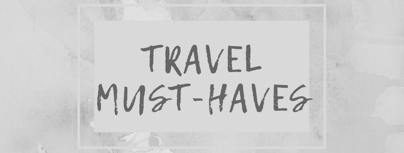 gray text reading Travel Must-Haves