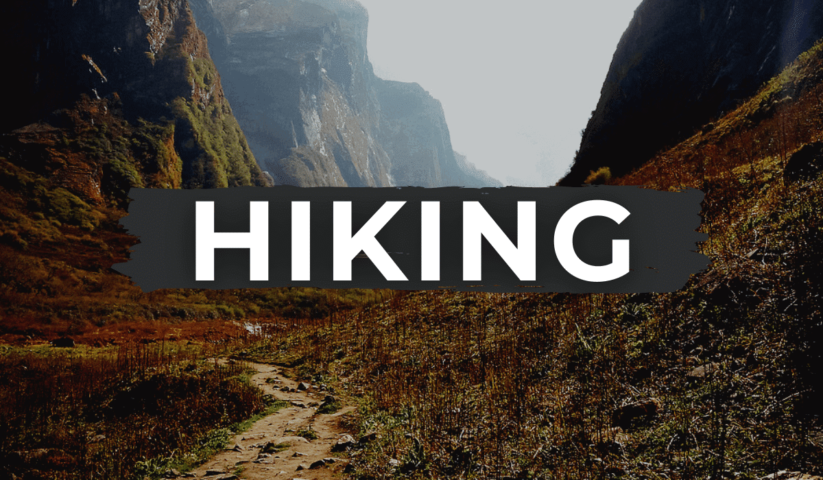 trail through a canyon with "HIKING" written in white across the photo